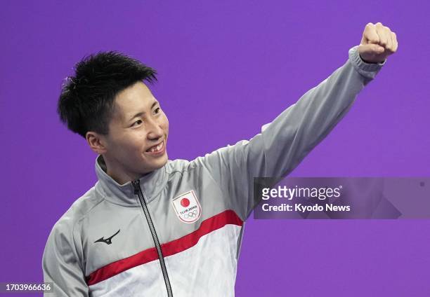 Japan's Hiroto Yamada acknowledges the crowd after finishing third in the men's trampoline gymnastics event at the Asian Games in Hangzhou, China, on...