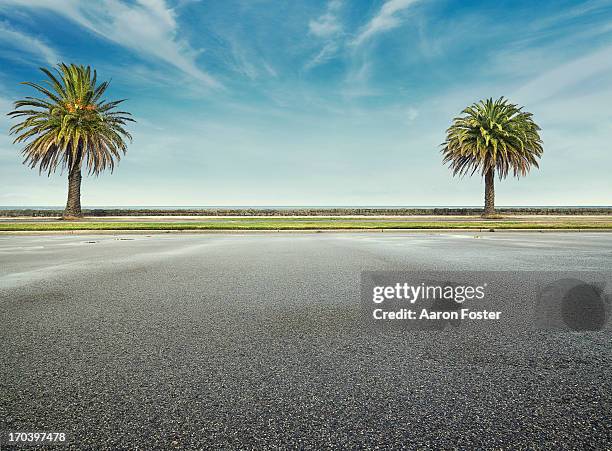beach parking lot - coloured tarmac stock pictures, royalty-free photos & images