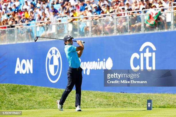Formula 1 driver Carlos Sainz tees off on the first hole during the All-Star Match at the 2023 Ryder Cup at Marco Simone Golf Club on September 27,...