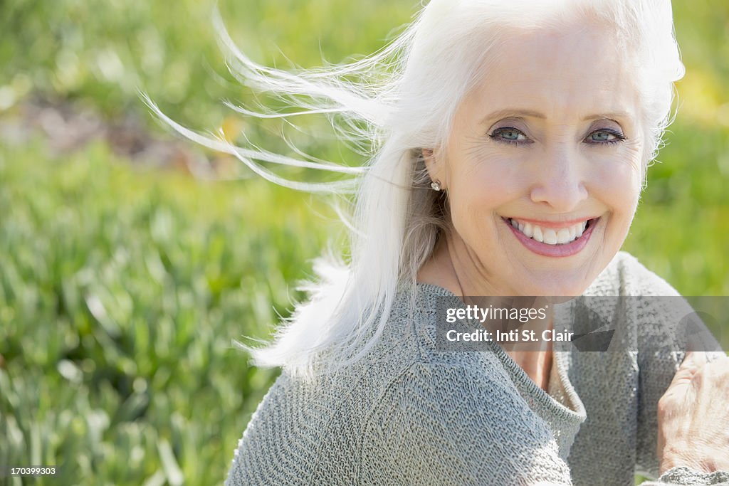 Smiling mature woman outside