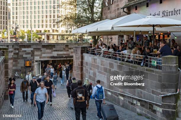 Shoppers at an entrance to Konigstor Passage shopping center in Nuremberg, Germany, on Monday, Oct. 2, 2023. German inflation plunged to its lowest...