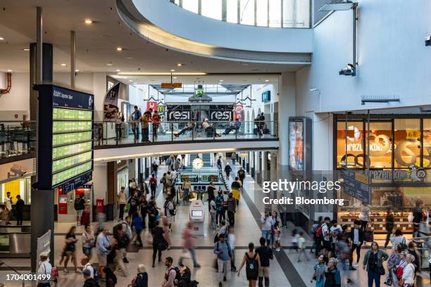 Shoppers and commuters inside a railway station's concourse in Nuremberg, Germany, on Monday, Oct. 2, 2023. German inflation plunged to its lowest...