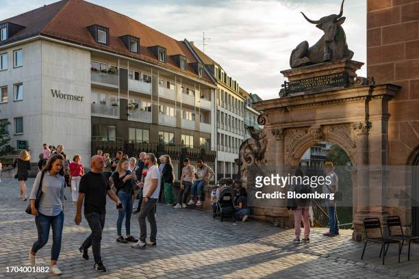 Shoppers and tourists on the Fleischbrucke bridge in Nuremberg, Germany, on Monday, Oct. 2, 2023. German inflation plunged to its lowest level in two...
