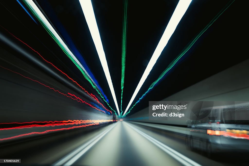 Speedy car driving in tunnel