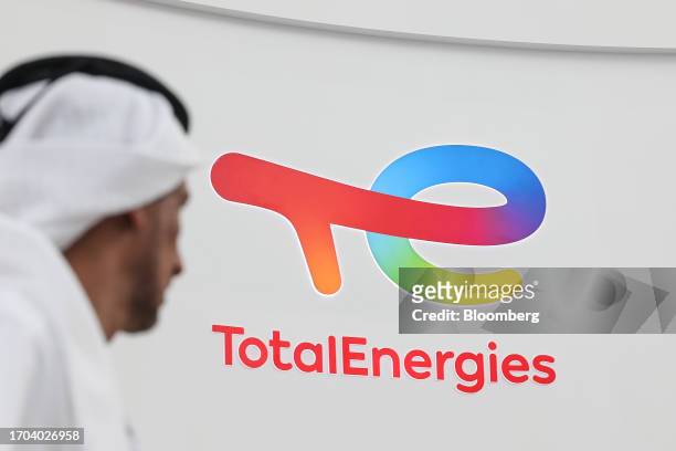 Logo at the TotalEnergies SE booth on day two of the Abu Dhabi International Petroleum Exhibition and Conference in Abu Dhabi, United Arab Emirates,...