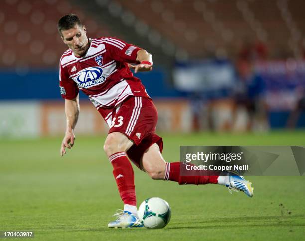 Kenny Cooper of FC Dallas controls the ball against the Houston Dynamo on June 12, 2013 at FC Dallas Stadium in Frisco, Texas.