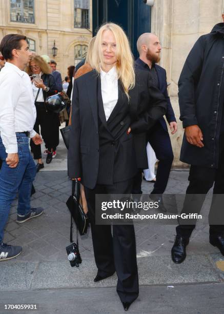 Pamela Anderson is seen attending The Row runway show during Paris Fashion Week on September 27, 2023 in Paris, France.