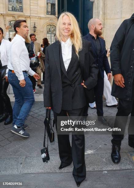 Pamela Anderson is seen attending The Row runway show during Paris Fashion Week on September 27, 2023 in Paris, France.