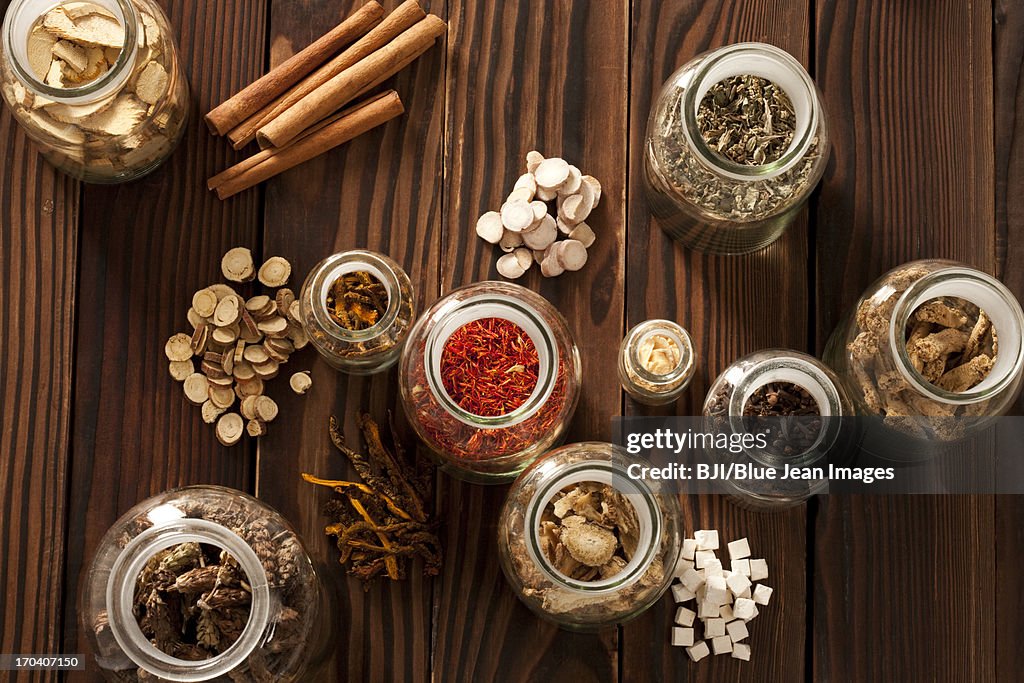 Various Chinese medical herbs in jars
