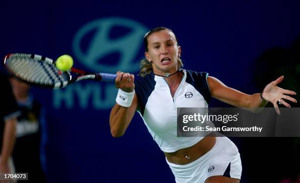 Iroda Tulyaganova from Uzbekistan in action against Serena Williams of the USA during the 2002/2003 Hyundai Hopman Cup at the Perth Superdome in...