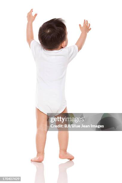 cute baby boy arms raised - baby reaching stock pictures, royalty-free photos & images