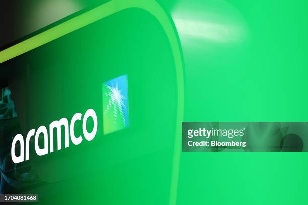 Signage above the Saudi Aramco booth on day two of the Abu Dhabi International Petroleum Exhibition and Conference in Abu Dhabi, United Arab...