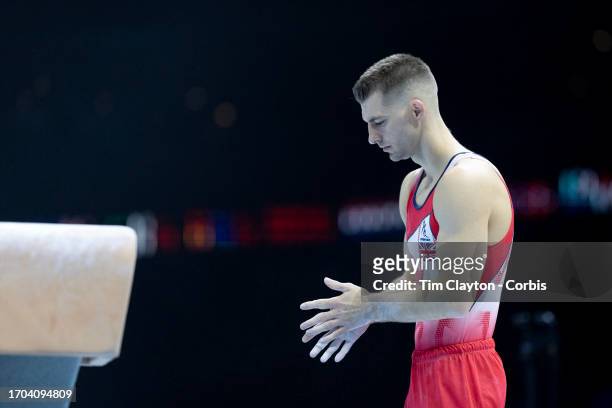 September 27: Max Whitlock of Great Britain prepares to perform his routine on the pommel horse during the team's podium training session at the...