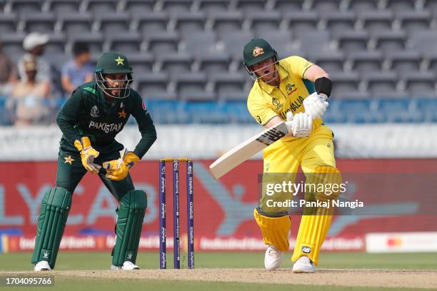 Steven Smith of Australia plays a shot during the ICC Men's Cricket World Cup India 2023 warm up match between Pakistan and Australia at Rajiv Gandhi...