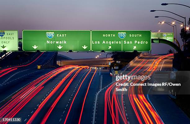 blurred view of traffic on highway - norwalk california stock pictures, royalty-free photos & images