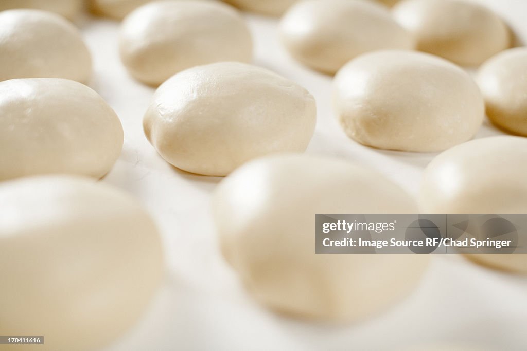 Close up of dough balls rising