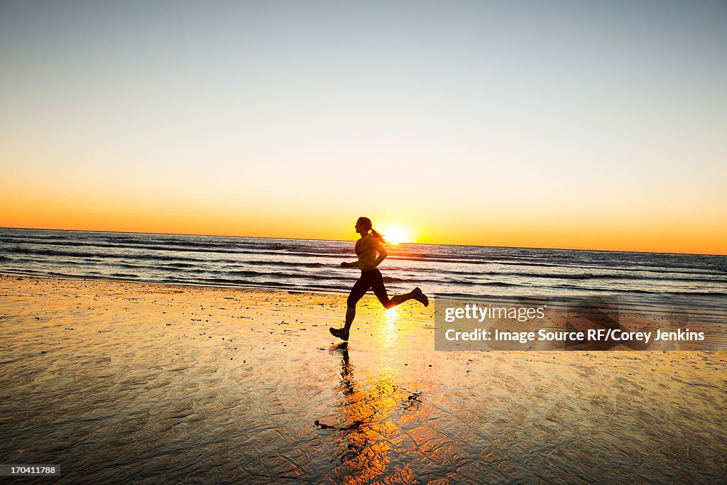 Woman running on beach