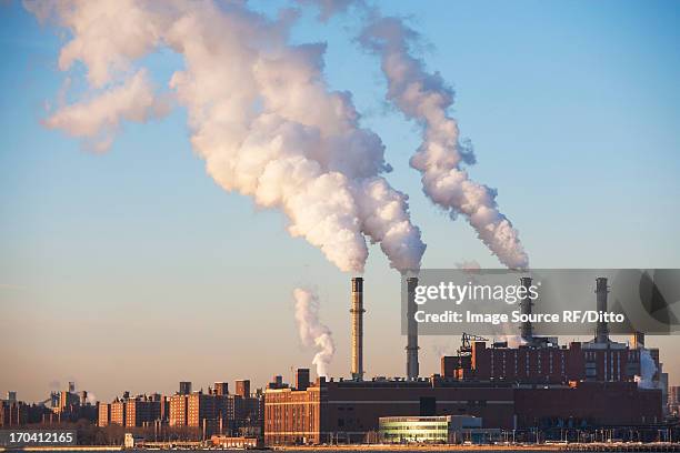 smoke billowing from industrial plant - chimney bildbanksfoton och bilder