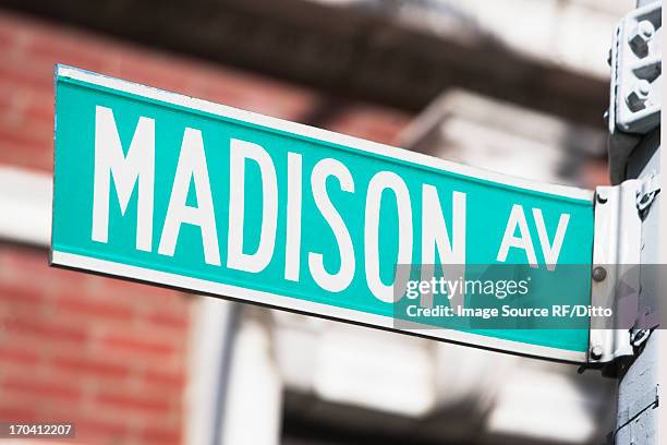 close up of madison avenue sign - madison avenue stock pictures, royalty-free photos & images