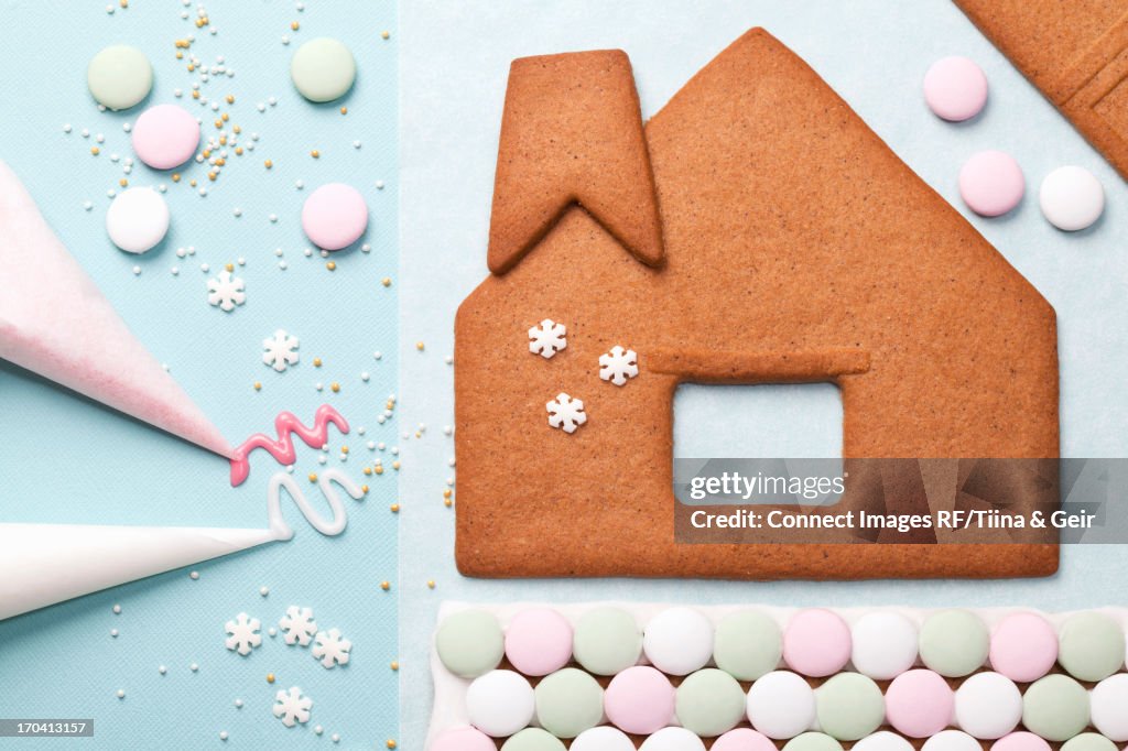 Gingerbread house components on table