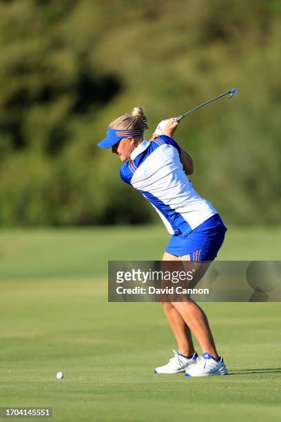 Charley Hull of The European Team plays her second shot on the 15th hole in her match with Leona Maguire against Nelly Korda and Ally Ewing during...
