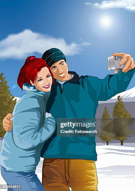 couple photographing themselves in a winter landscape - paar in sportkleidung stock-grafiken, -clipart, -cartoons und -symbole