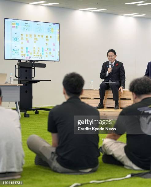 Japanese Prime Minister Fumio Kishida attends a meeting with experts to discuss measures to implement administrative reforms through digitalization...