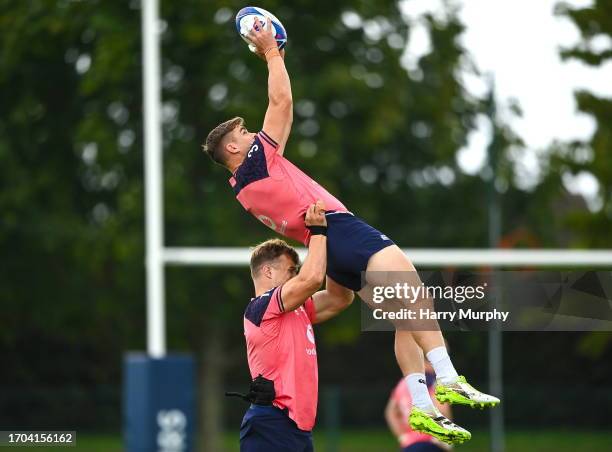 Tours , France - 3 October 2023; Garry Ringrose is lifted by Josh van der Flier during an Ireland Rugby squad training session at Complexe de la...