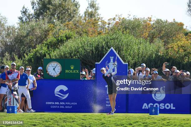 Nelly Korda of The United States Team plays her tee shot on the 17th hole in her match against Carlota Ciganda during the final day singles matches...
