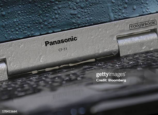 Panasonic Corp.'s Toughbook laptop computer undergoes a water resistance test at the company's plant in Kobe City, Hyogo Prefecture, Japan, on...