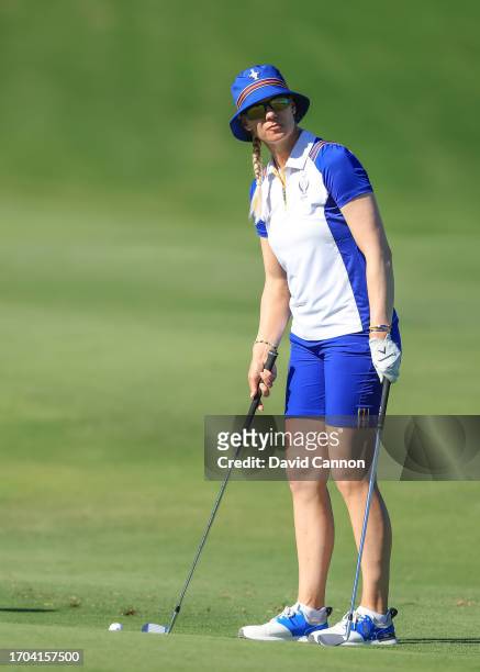 Madelene Sagstrom of The European Team plays her second shot in her match with Emily Kristine Pedersen on the ninth hole in their match against Rose...
