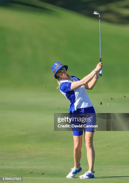 Madelene Sagstrom of The European Team plays her second shot in her match with Emily Kristine Pedersen on the ninth hole in their match against Rose...