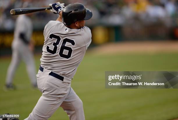 Kevin Youklis of the New York Yankees bats against the Oakland Athletics at O.co Coliseum on June 11, 2013 in Oakland, California.