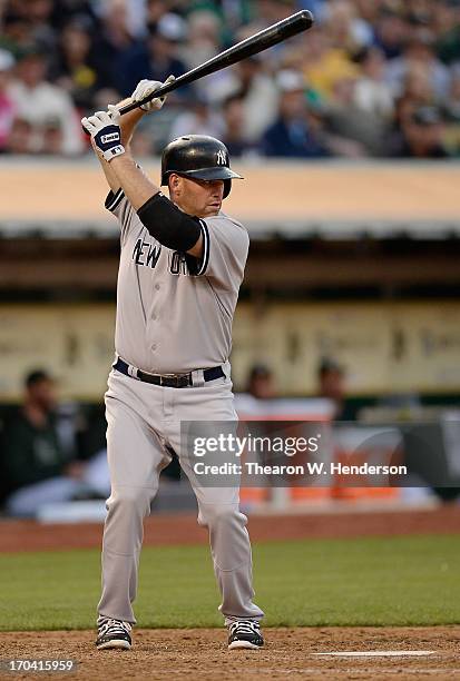 Kevin Youklis of the New York Yankees bats against the Oakland Athletics at O.co Coliseum on June 11, 2013 in Oakland, California.