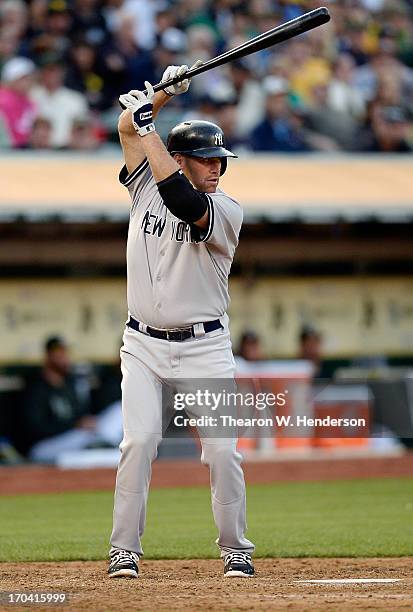 Kevin Youklis of the New York Yankees bats against the Oakland Athletics at O.co Coliseum on June 11, 2013 in Oakland, California.