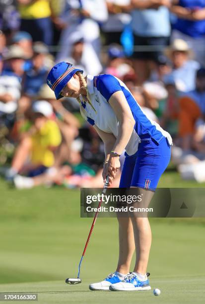 Madelene Sagstrom of The European Team putts on the 9th hole in her match with Emily Kristine Pedersen in her match against Rose Zhang and Andrea Lee...