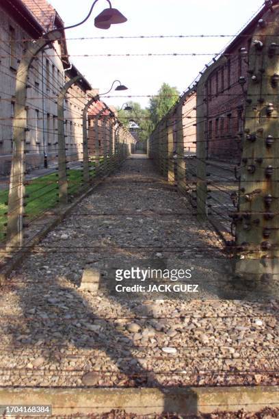 View 17 July 1999 of fences with concrete posts surrounding the barracks where deportees were detained at the concentration and death camp of...