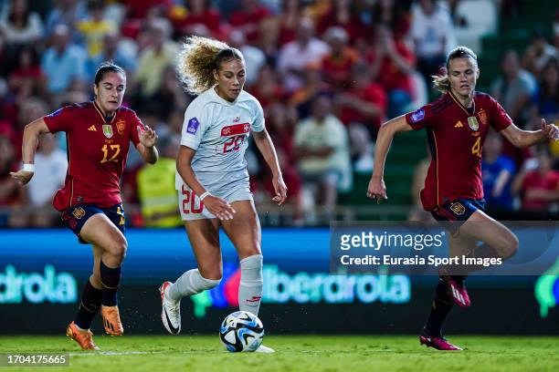 Alayah Pilgrim of Switzerland is chased by Oihane Hernandez of Spain during the UEFA Women's Nations League Group D match between Spain and...