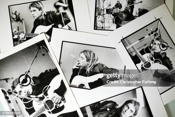 Selection of prints by Michel Linssen from the Redferns collection, depicting Kurt Cobain playing the guitar in a recording studio, pictured at the...