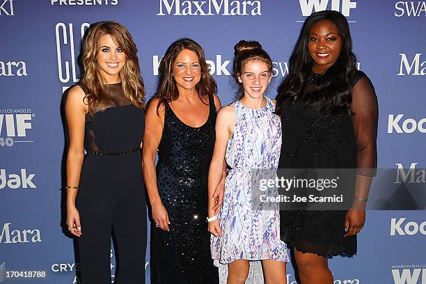 Singer Angie Miller, president of Women in Film Cathy Schulman, daughter and Candice Glover arrive at the 2013 Women in film's Crystal + Lucy Awards...