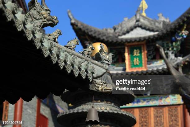 tower shape incense burner in a temple - buddhist bells stock pictures, royalty-free photos & images