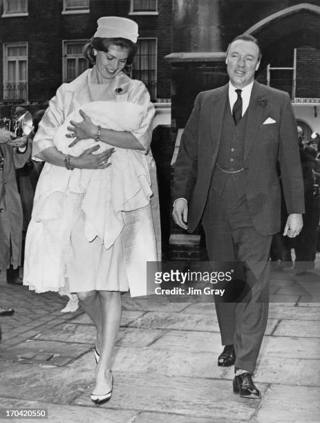 Princess Margaretha of Sweden holding their daughter Sibylla Louise Ambler, with husband John Ambler arriving at St. Paul's Church, Knightsbridge,...