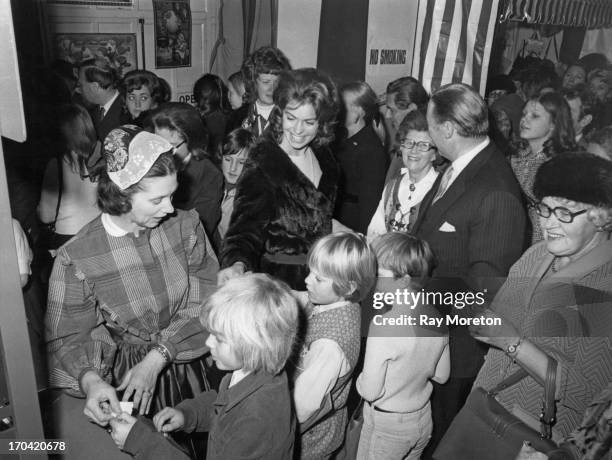 Princess Margaretha of Sweden and her husband John Ambler , opening the annual Swedish Christmas Fair being held at the Swedish Church Hall, London,...