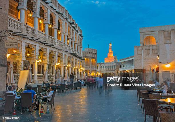 waqif souk and fanar tower in  doha, qatar. - souk stock-fotos und bilder