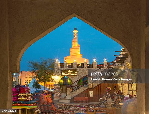 waqif souk and fanar tower in doha, qatar. - doha stock pictures, royalty-free photos & images