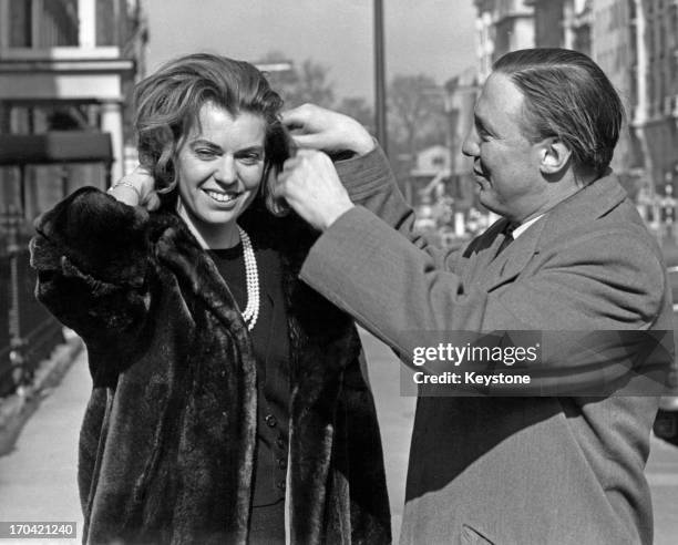 Princess Margaretha of Sweden with her fiance John Ambler outside the Swedish Embassy, London, 9th March 1964. This is the first full day the couple...