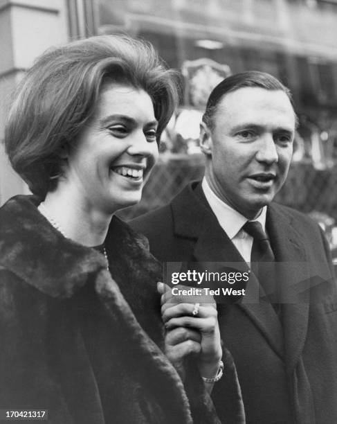 Princess Margaretha of Sweden and fiance John Ambler show their engagement ring to photographers outside the jewellers in Conduit Street, London, 9th...