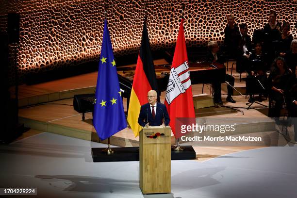 Bundesrat President and Mayor of the northern City of Hamburg Peter Tschentscher, addresses the guests of a ceremony in Hamburgs Elbphilharmonie...
