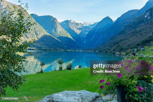 view to briksdalsbreen glacier in olden, norway - olden norway stock pictures, royalty-free photos & images