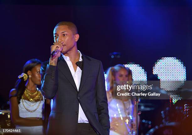 Singer Pharrell attends the new Myspace launch event at the El Rey Theatre on June 12, 2013 in Los Angeles, California.